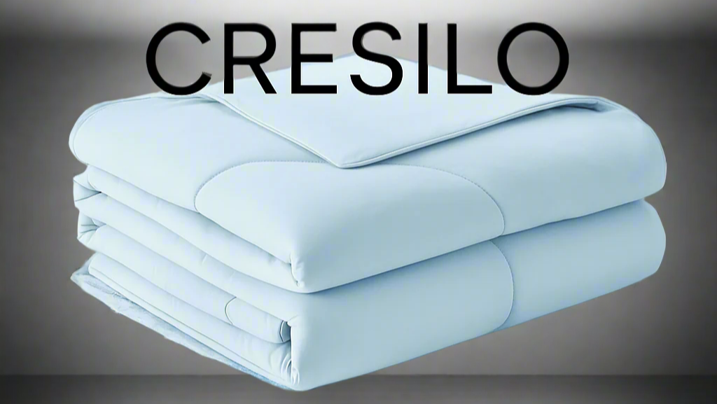 Folded blanket with CRESILO branding on a snowy background